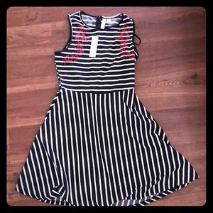 Francesca’s black and white dress